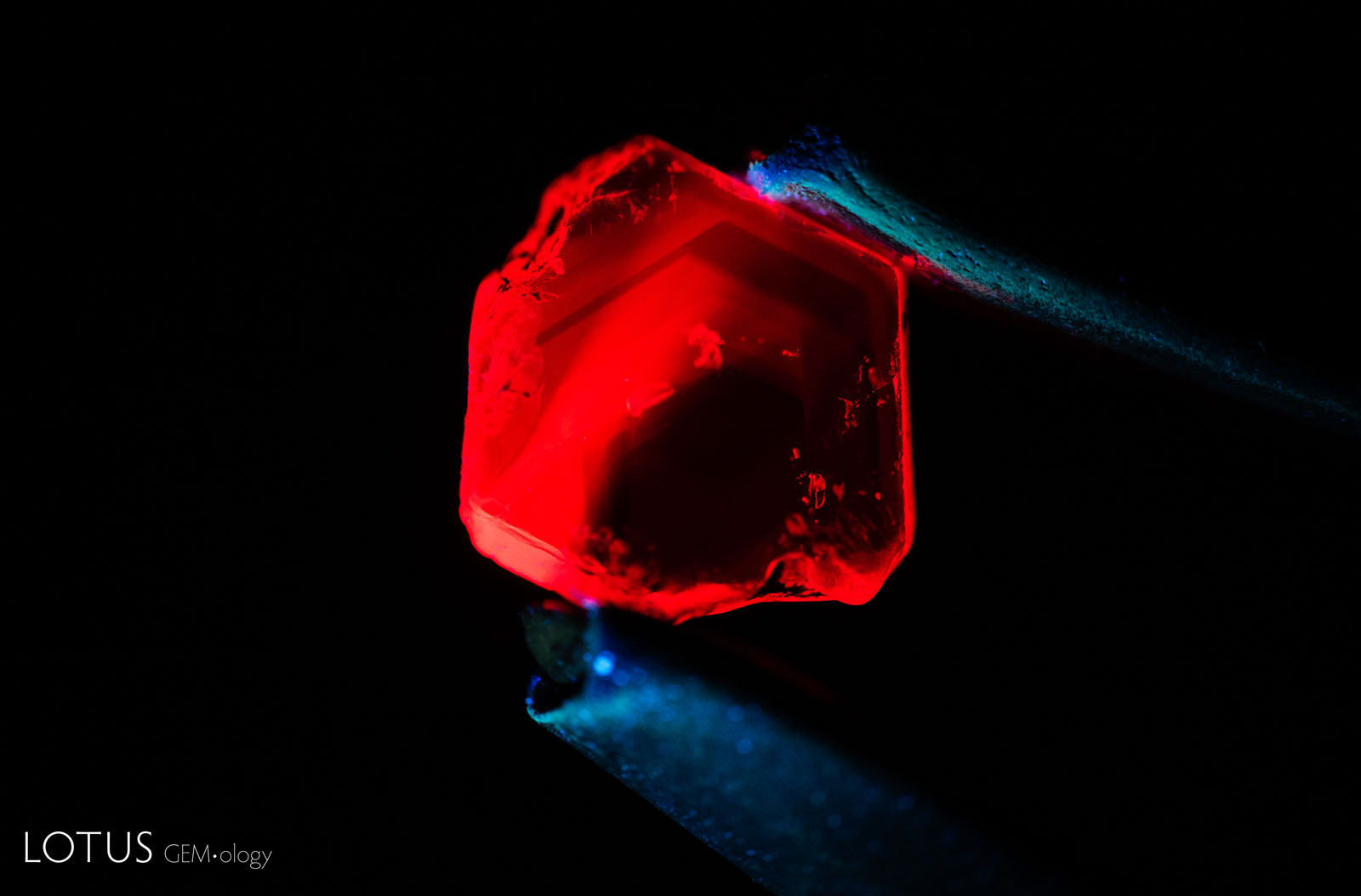 Sample 17 displays a strong red fluorescence in long-wave UV illumination prior to heating.