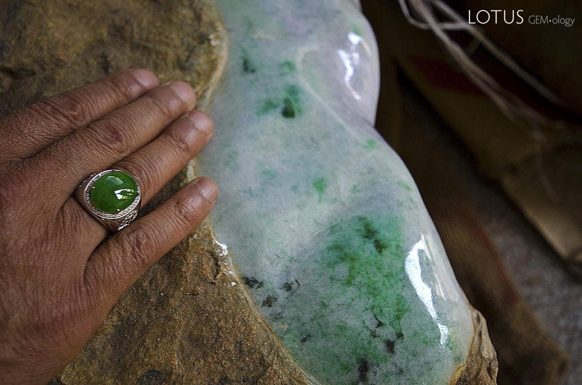 Figure 13. Although nephrite jade is China's original "Stone of Heaven," fine jadeite, as shown here, is the most sought-after of jades in the Chinese community today. While Chinese nephrite has a waxy luster, that of fine jadeite is almost vitreous. Photo Richard W. Hughes in Ruili, China.