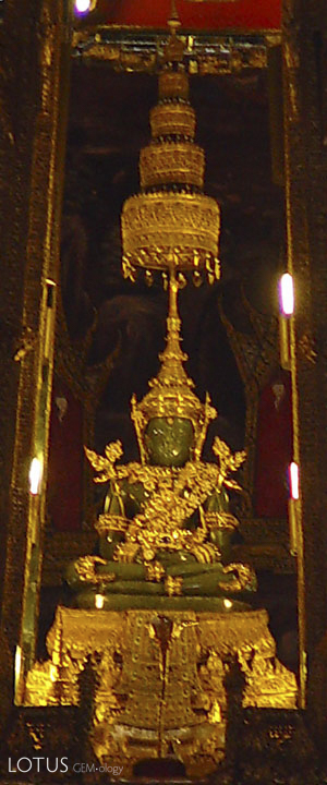 A close up of the Emerald Buddha in summer attire. Photo: Wikipedia