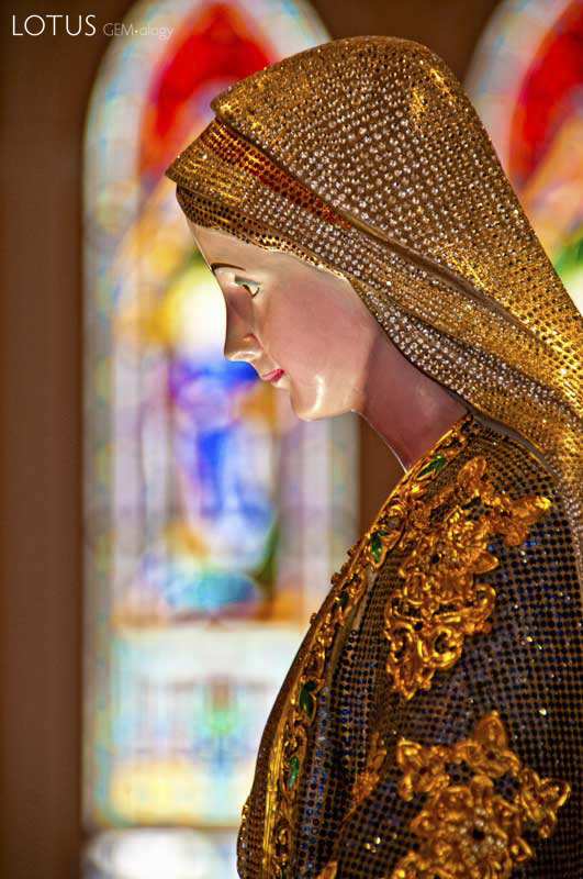 In 2009, the Mary Immaculate Conception Cathedral in Chanthaburi was refurbished. It now includes this 1.3 m icon of Mary, inlaid with over 20,000 carats of sapphire and other gems. Photo &copy; Richard W. Hughes.