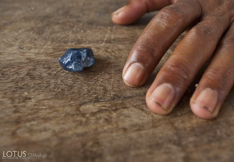 Rough sapphire at Pailin, Cambodia. Photo &copy; Richard W. Hughes.
