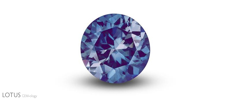 Figure 7. 15.6 ct blue zircon from Joel Arem's Color Encyclopedia of Gemstones (1977), showing an obvious pleochroic "bow tie" effect. Photo &copy; Joel Arem