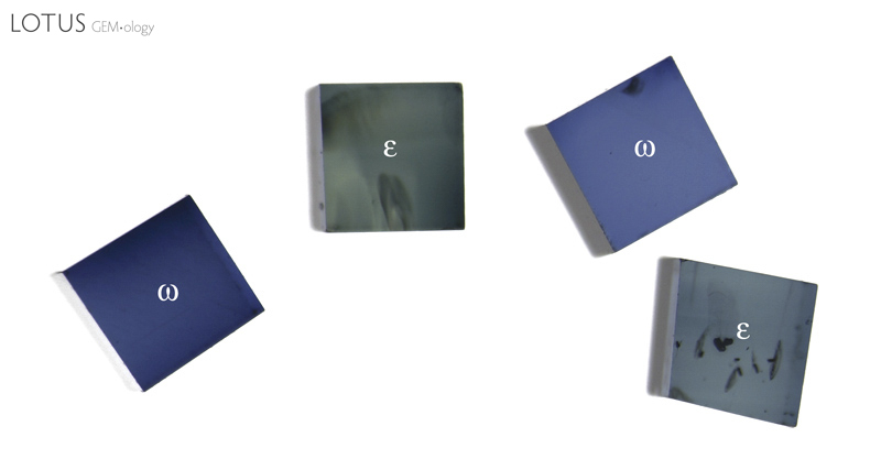 Figure 15. Small cubes of blue sapphire while viewed perpendicular&nbsp;to the optic axis through a polarizing filter. Rotating either the gems or polarizer will switch the two pleochroic colors of each piece. Photo: Wimon Manorotkul