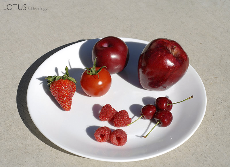 Lotus Gemology: Does the often-superior red sensitivity of women's color vision result from a need to distinguish edible from poisonous fruit? And should wholesale ruby dealers now be considering hiring more women?