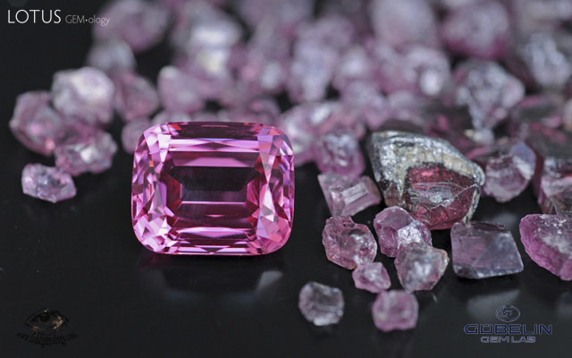 Fine Pamir spinel (over 20 carats) from Tajikistan, with rough spinels from the Kuh-i-Lal mines. Photo: Vincent Pardieu/G&uuml;belin Gem Lab, 2008.