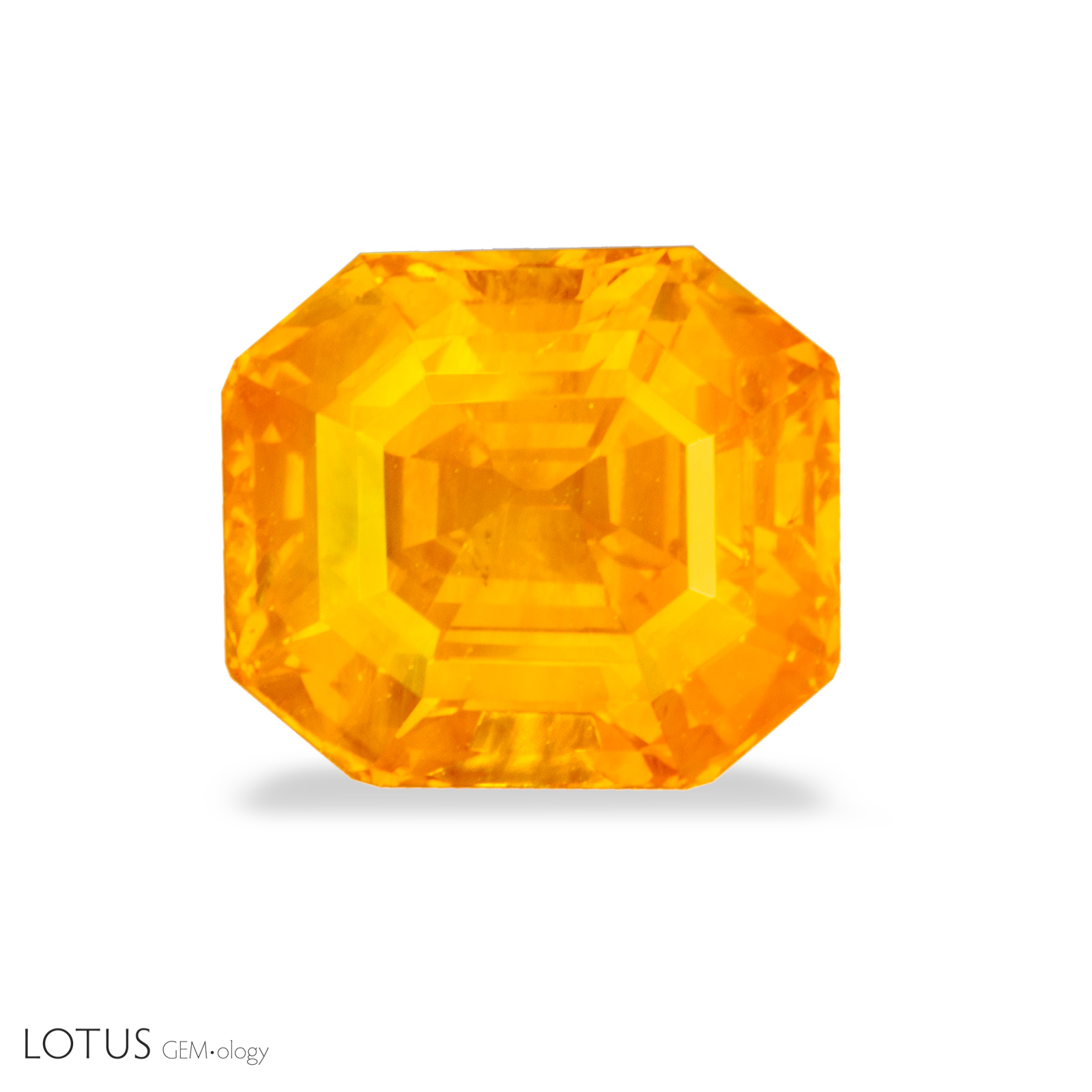 Left: Before a fade test, this approximately 10 ct sapphire displayed a strong orange hue.