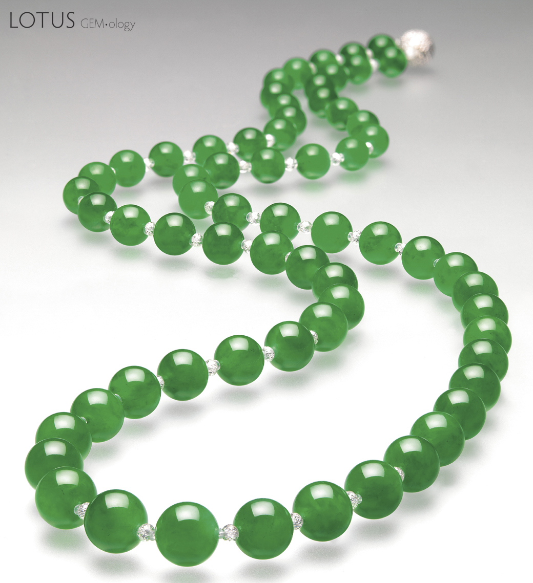 Figure 4. Doubly Fortunate In 1997, this necklace of 27 perfectly matched beads cut from the famous "Doubly Fortunate" jadeite boulder set a new record for jade, selling for an amazing US$9,390,922. Image &copy;&nbsp;Christie's