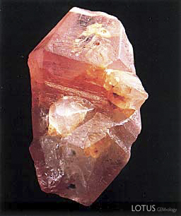 Sri Lankan padparadscha sapphire crystal, 8 by 5 cm; Collection: Paul Ruppenthal; Photo: Studio Hartmann; From Gem & Crystal Treasures by Peter Bancroft