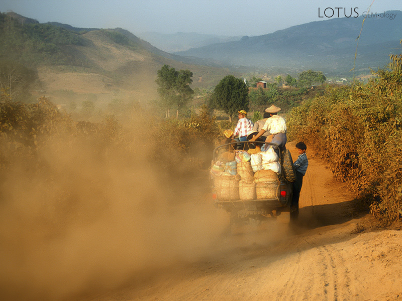 In the dry season, mud turns to dust, a fine powder that coats every exposed surface and makes life miserable. Road between Hweka and Hpakan