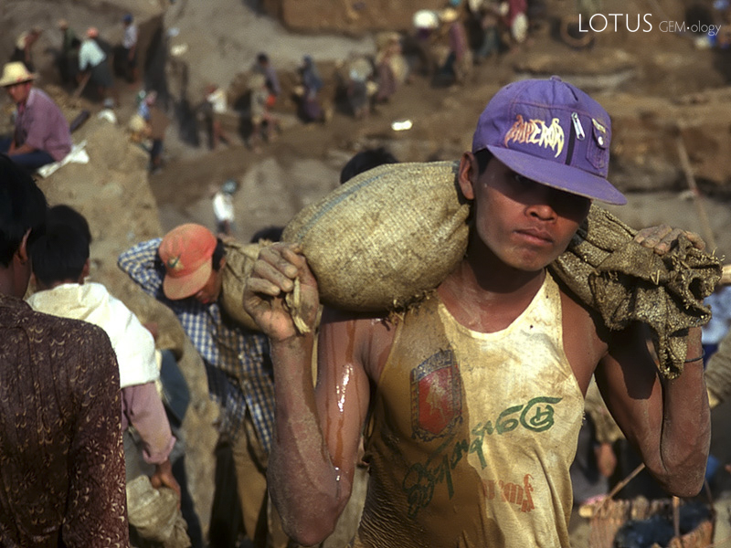 Building the pyramids Over 10,000 miners snake up the hillside at Hpakangyi.