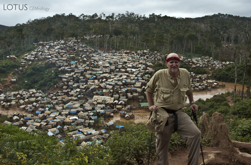 The author above the village of Moramanga, where 15,000 people claw rubies from the bush. Photo: Richard W. Hughes